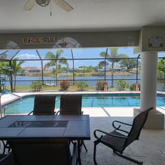 Canal Home w/ Escape Room, Pool & Dock, Pets OK