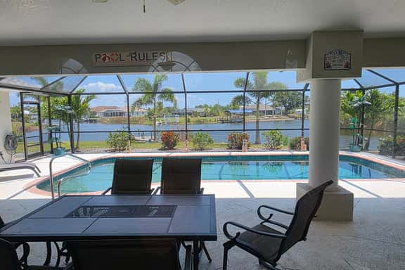 Canal Home w/ Escape Room, Pool & Dock, Pets OK - Image 1